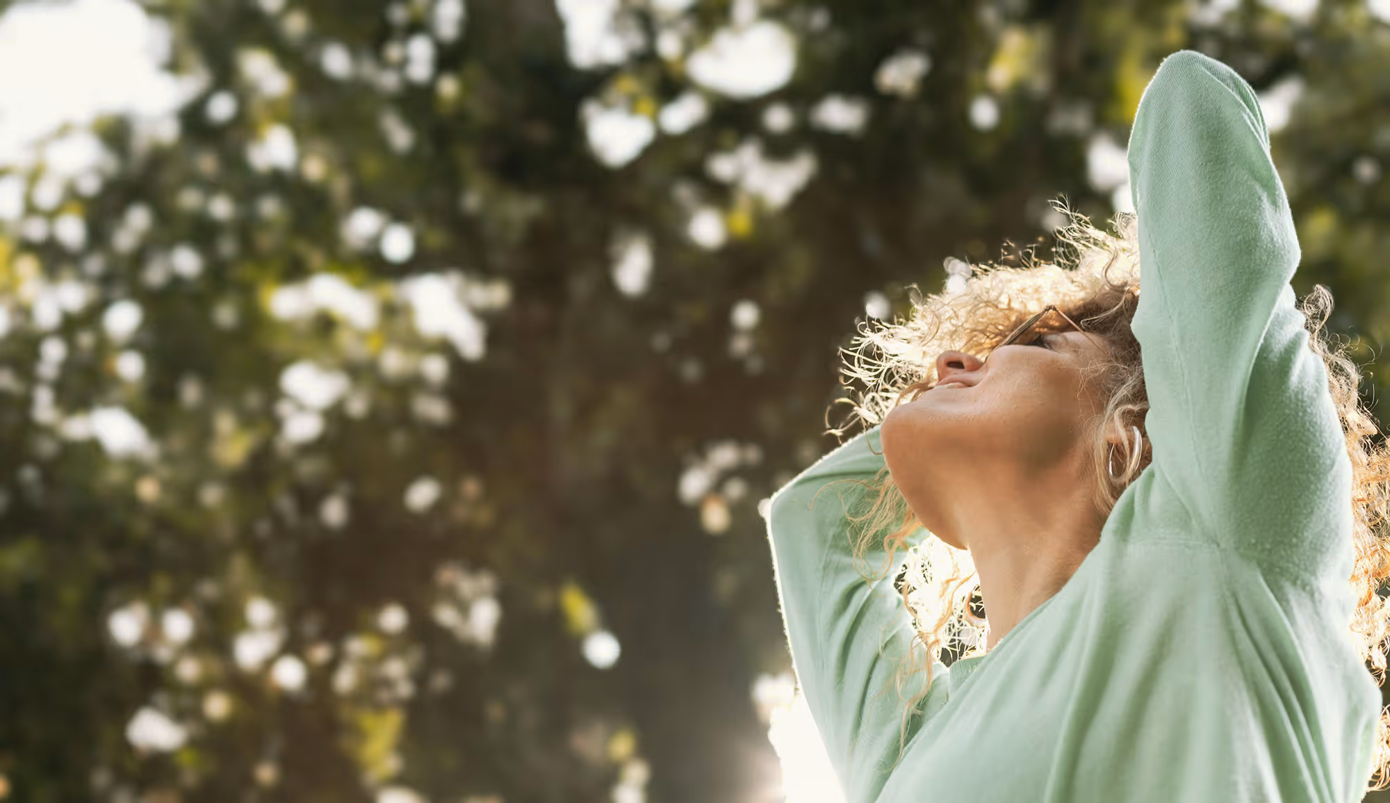 Vitality Health and Wellness Coaching NZ image of woman in nature.