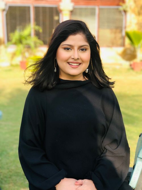 a headshot of the product designer