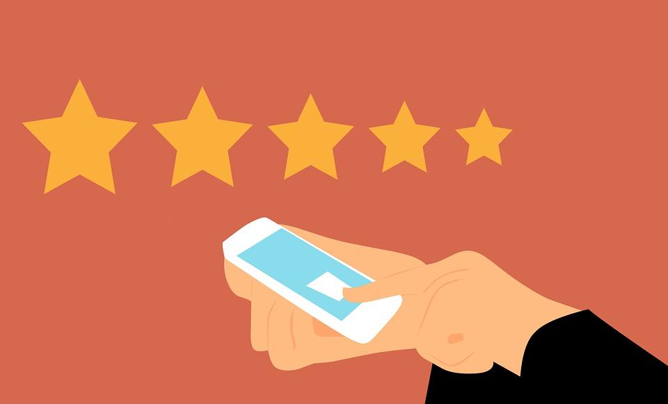 Computer-Generated Image of a Hand Tapping on a Phone with An Index Finger and Five Stars