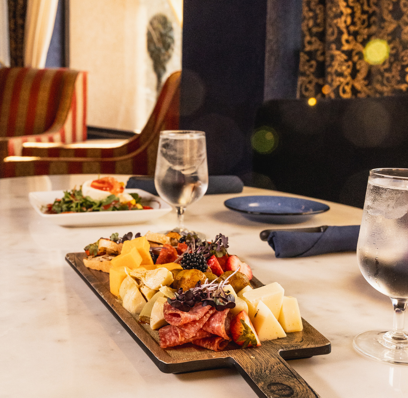 Mezcla restaurant with table with charcuterie tray
