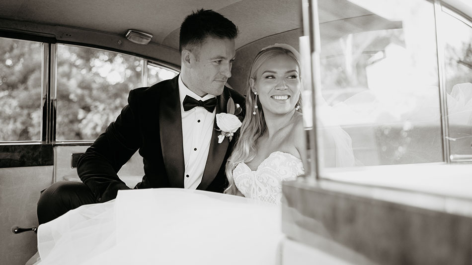 a man and woman in a car