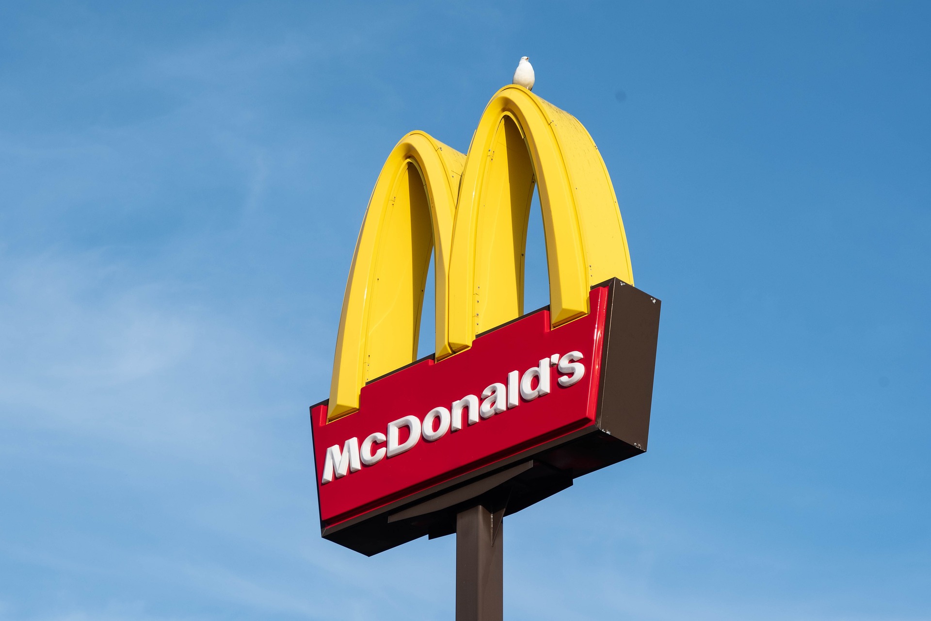 A McDonald's sign showing the golden arches.