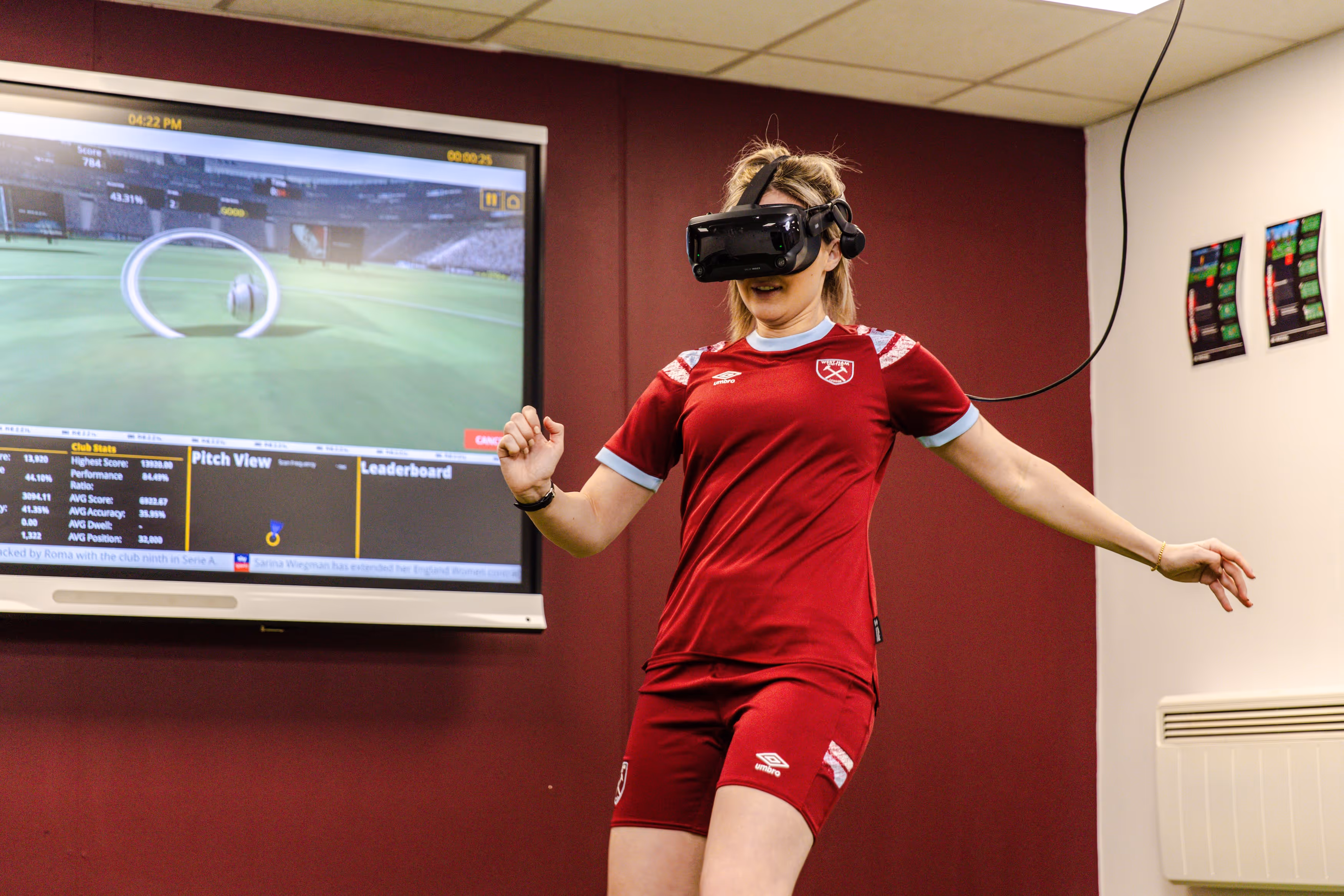 Girl plays VR soccer