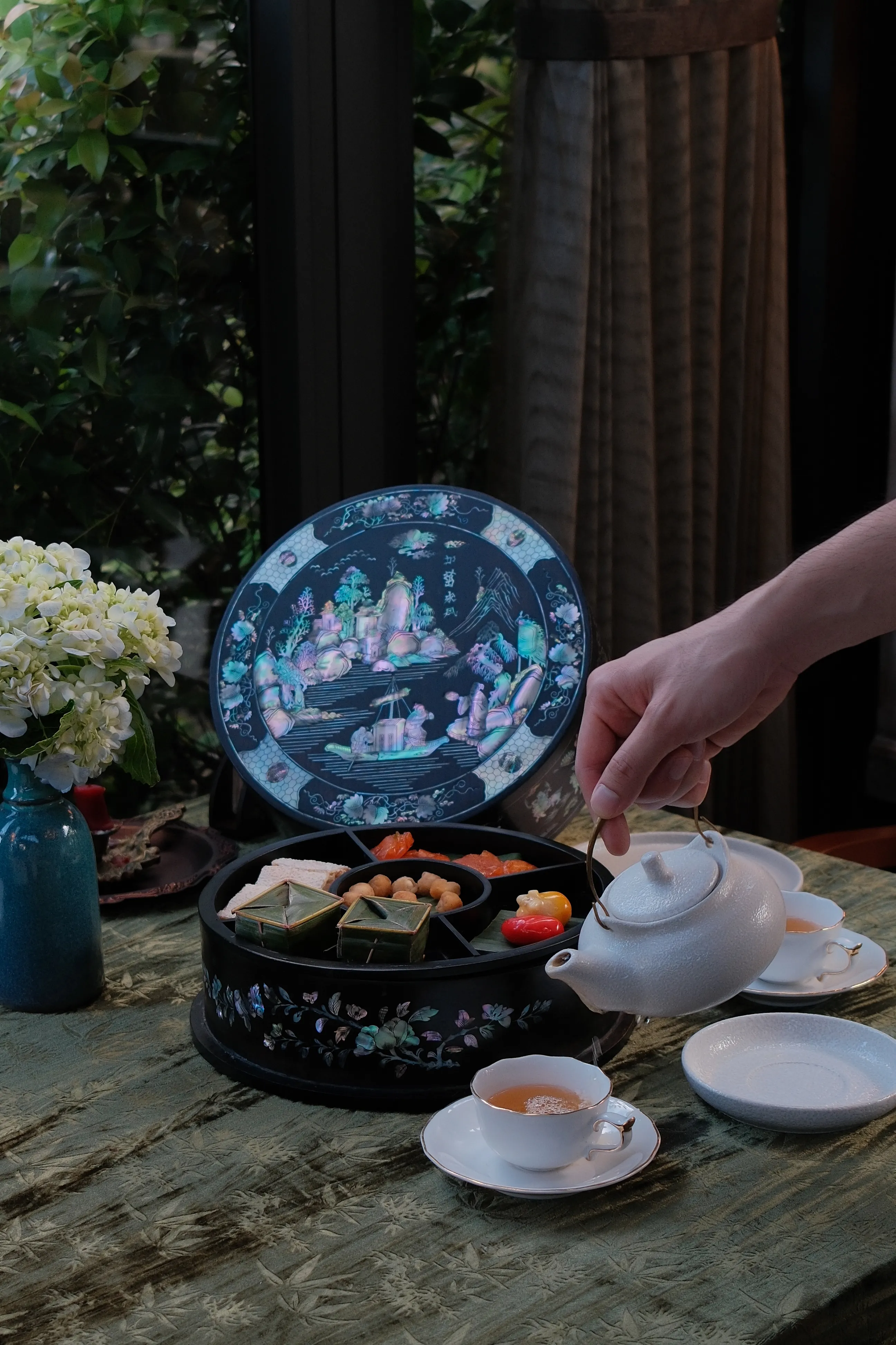 Mother-of-pearl inlaid afternoon tea snack box handcrafted by a Hue artisan.