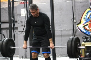 Marcel doing a haltling clean deadlift during the Oly Class. 