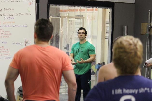 Coach Mario explaining the workout
