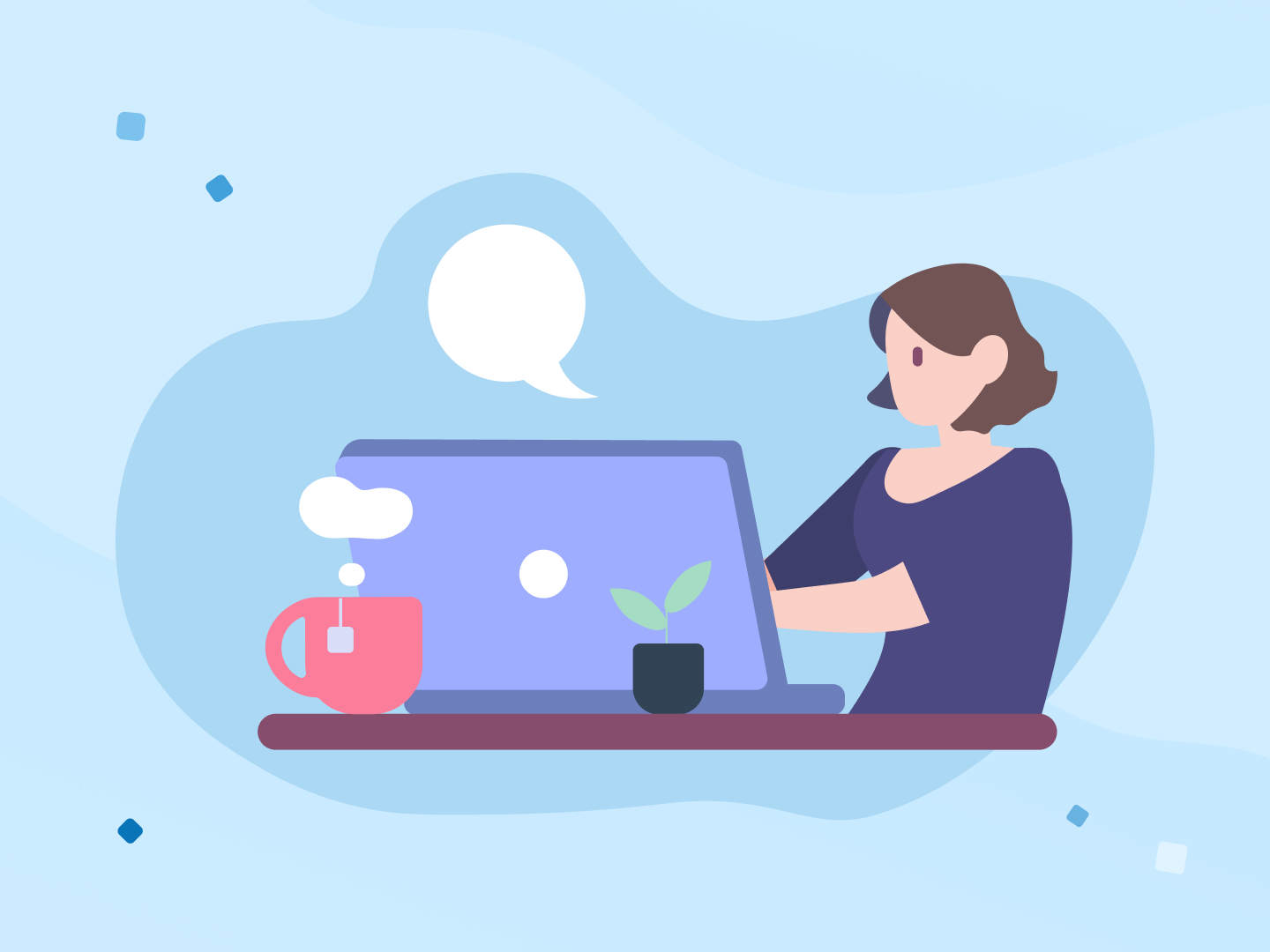 Ein junge Frau sitzt am Schreibtisch an ihrem Computer und tippt.