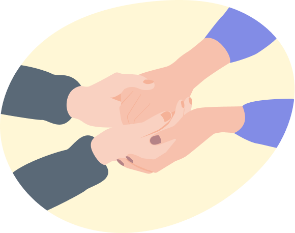 Eine Person greift liebevoll die Hand einer anderen Person, um Beistand zu signalisieren.