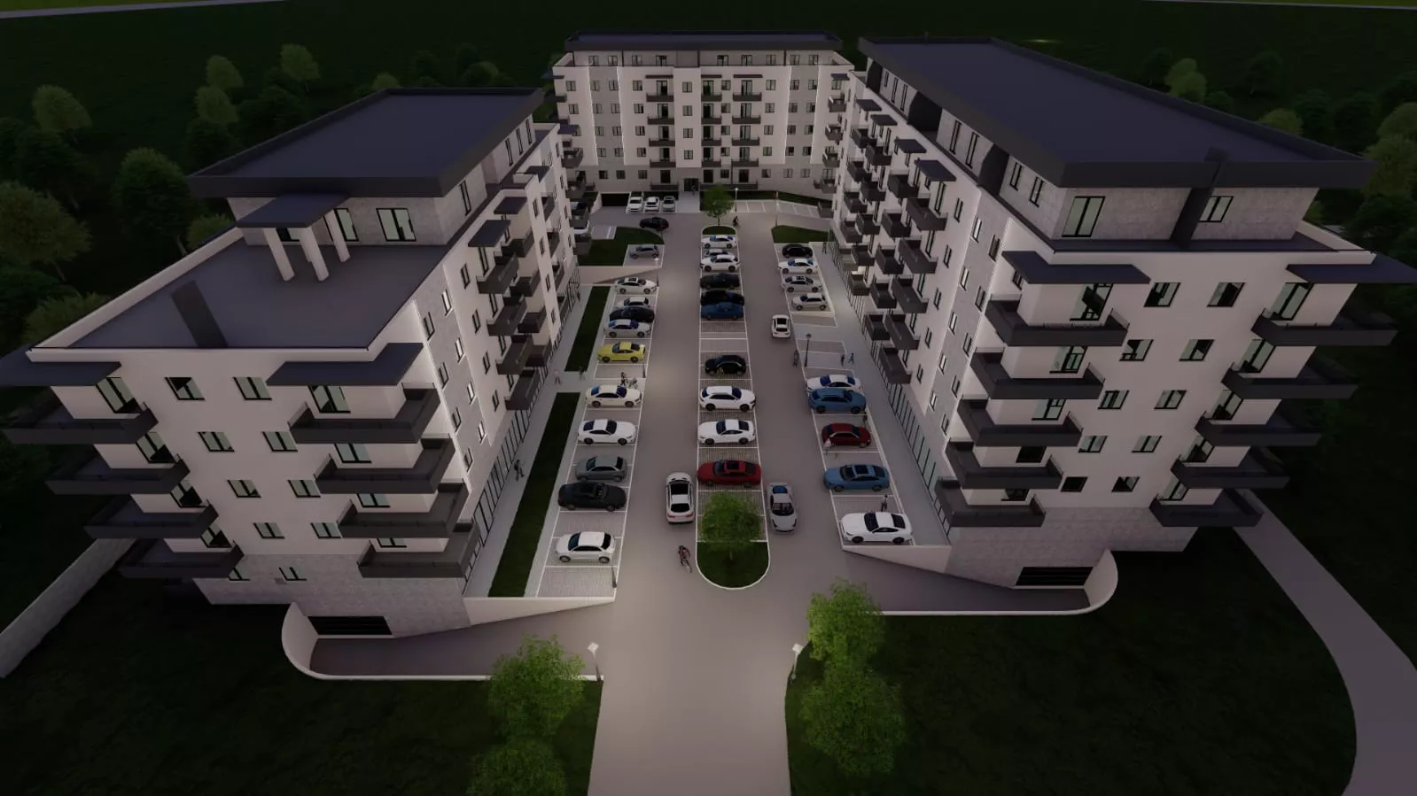 Aerial night view of a modern residential complex with three multi-story buildings surrounding a well-lit parking lot filled with cars.