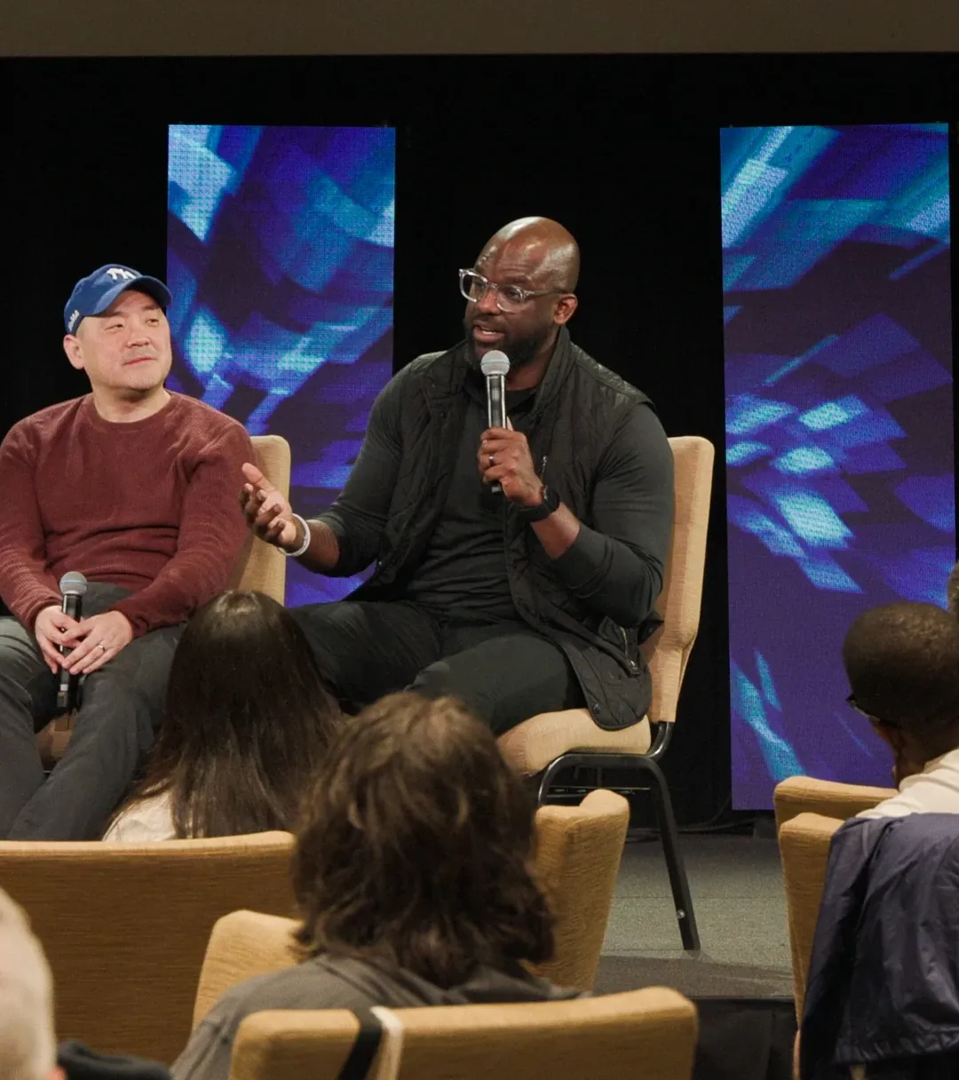 dan on stage for a live podcast