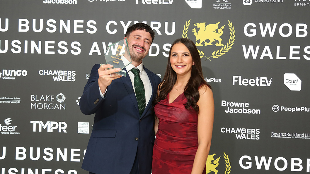 Co-Founder Harry Kimberley-Bowen with the Welsh Business Awards Best Start Up trophy