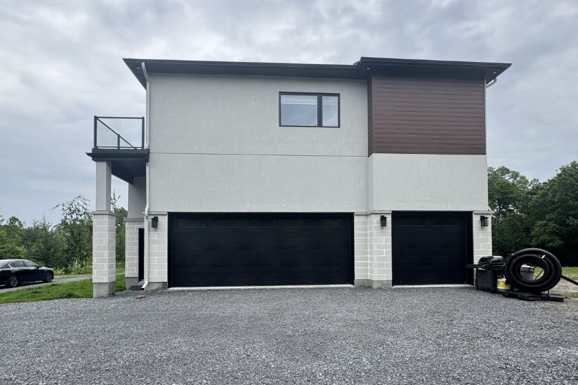 Rear exterior of a custom home in Ottawa by OGC