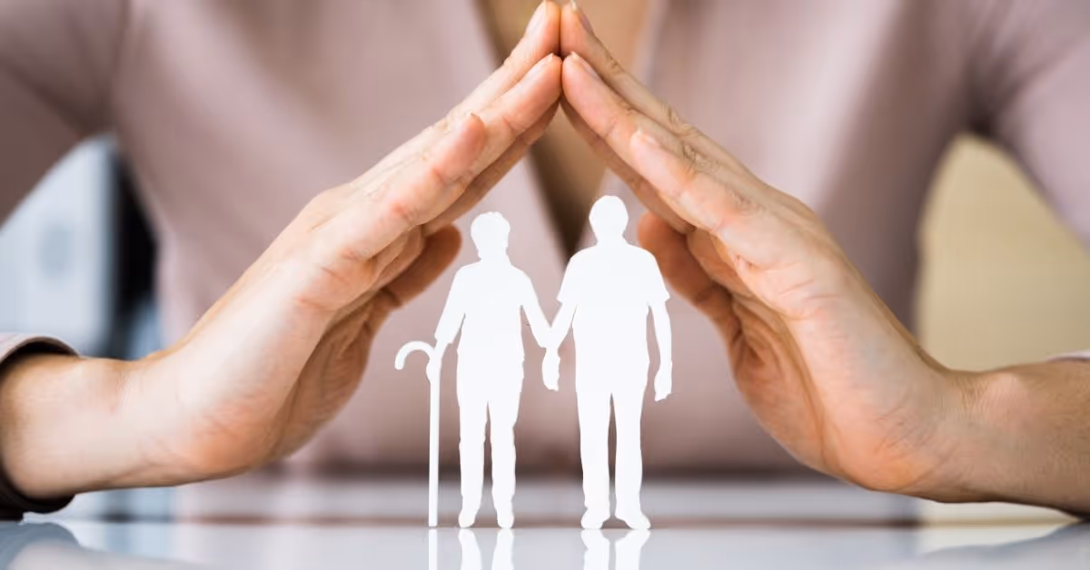 Twee ouderen onder twee handen