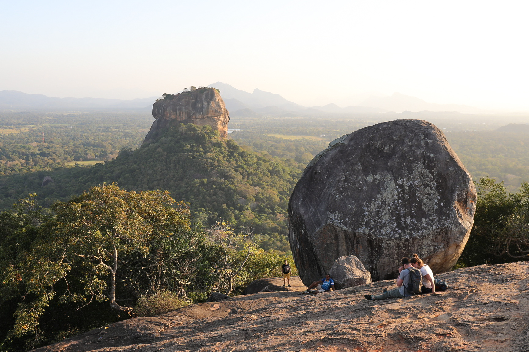 View from Pidurangala Rock looking across jungle plains towards Sigiriya Rock 