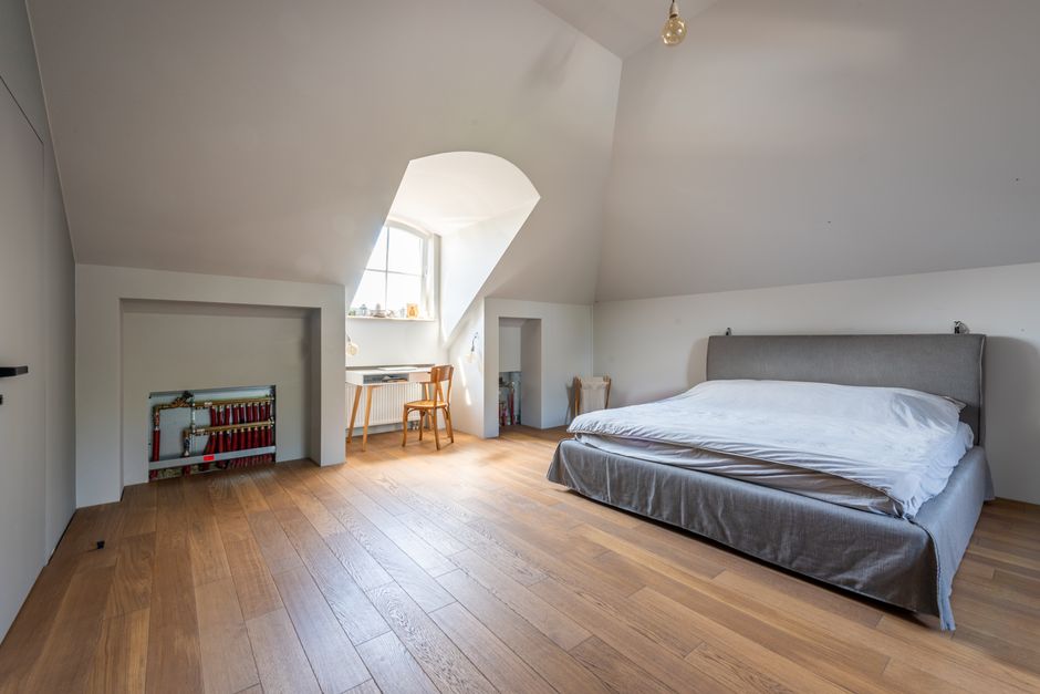 How to Turn Your Attic Into the Ultimate Custom Hideaway