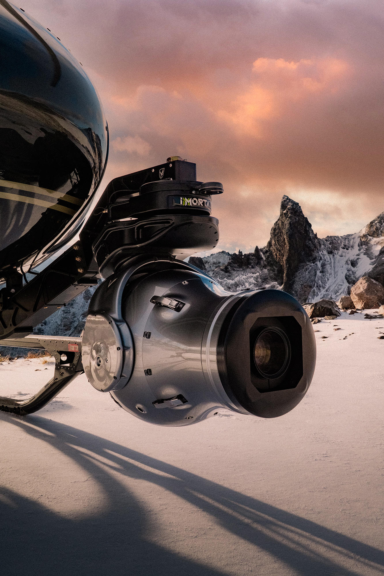 Immortal Phoenix head with cinema lens mounted on a helicopter