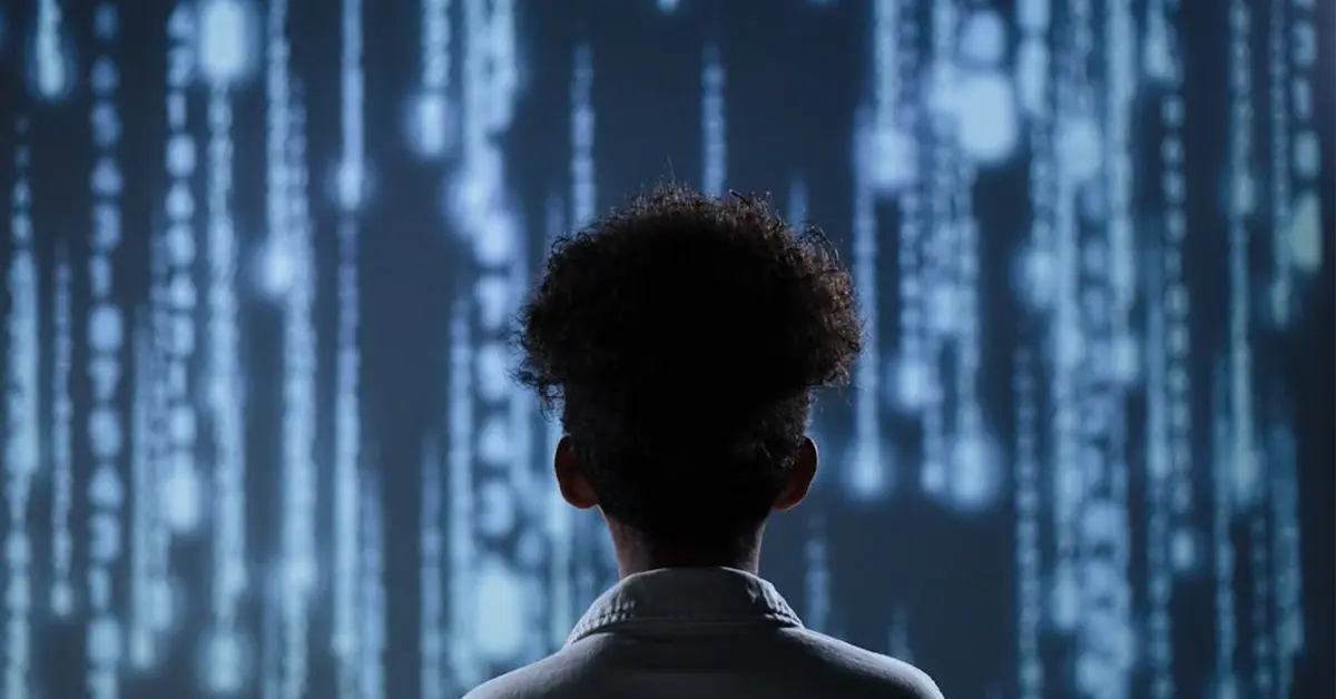 A person stares at falling computer code