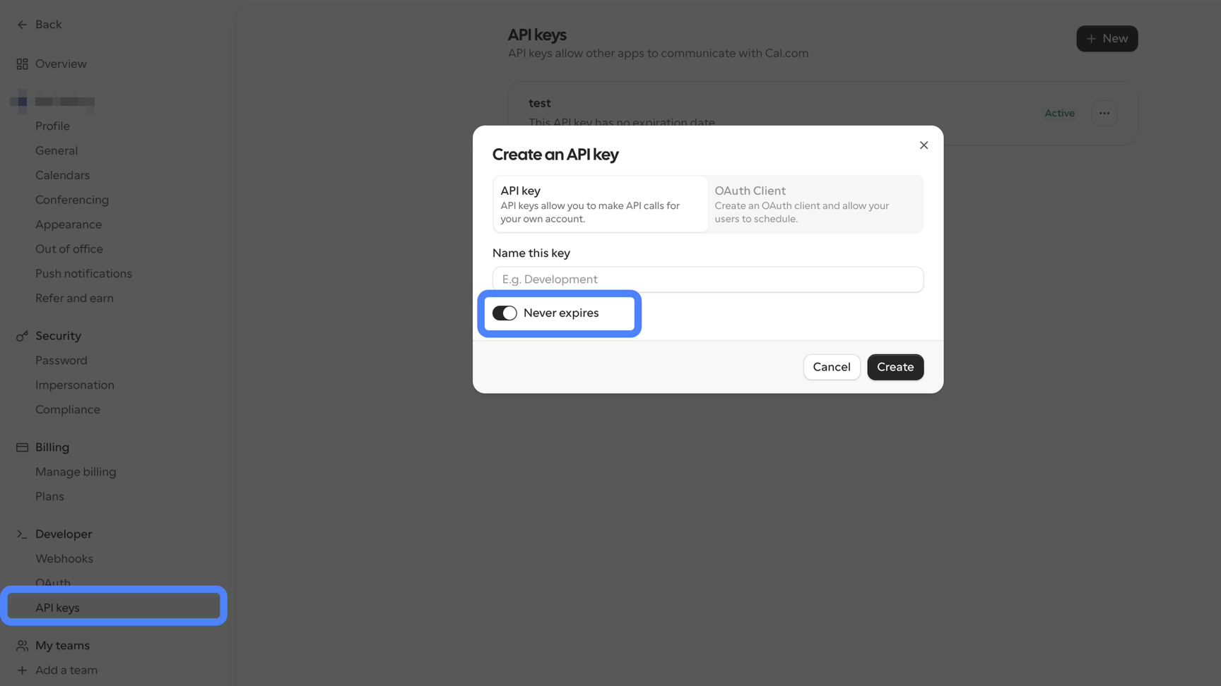 Cal.com's Create an API key dialog, with Never expires turned on.