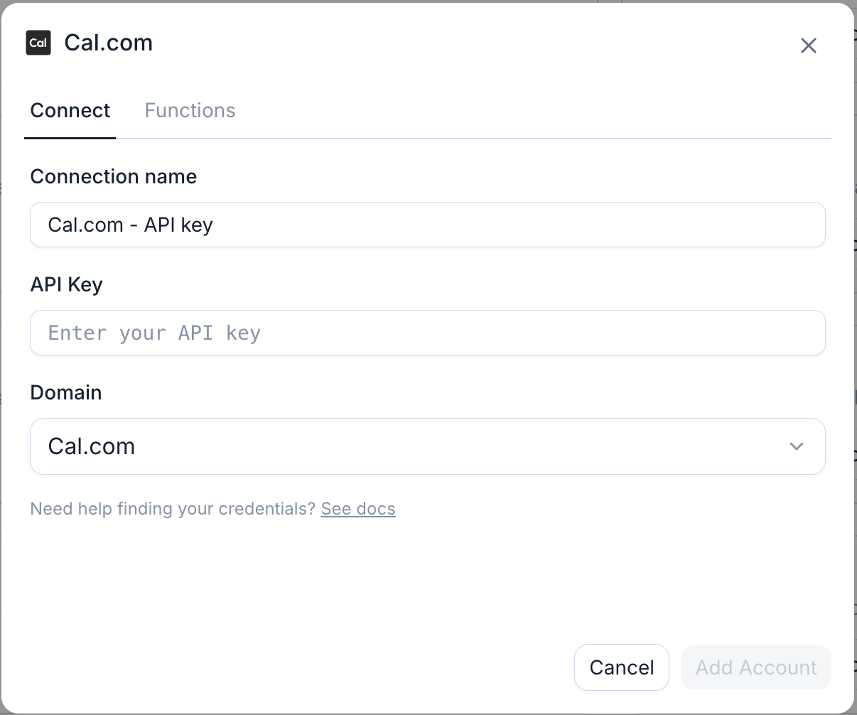 The Cal.com connection dialog: API key plus the domain your account lives on.