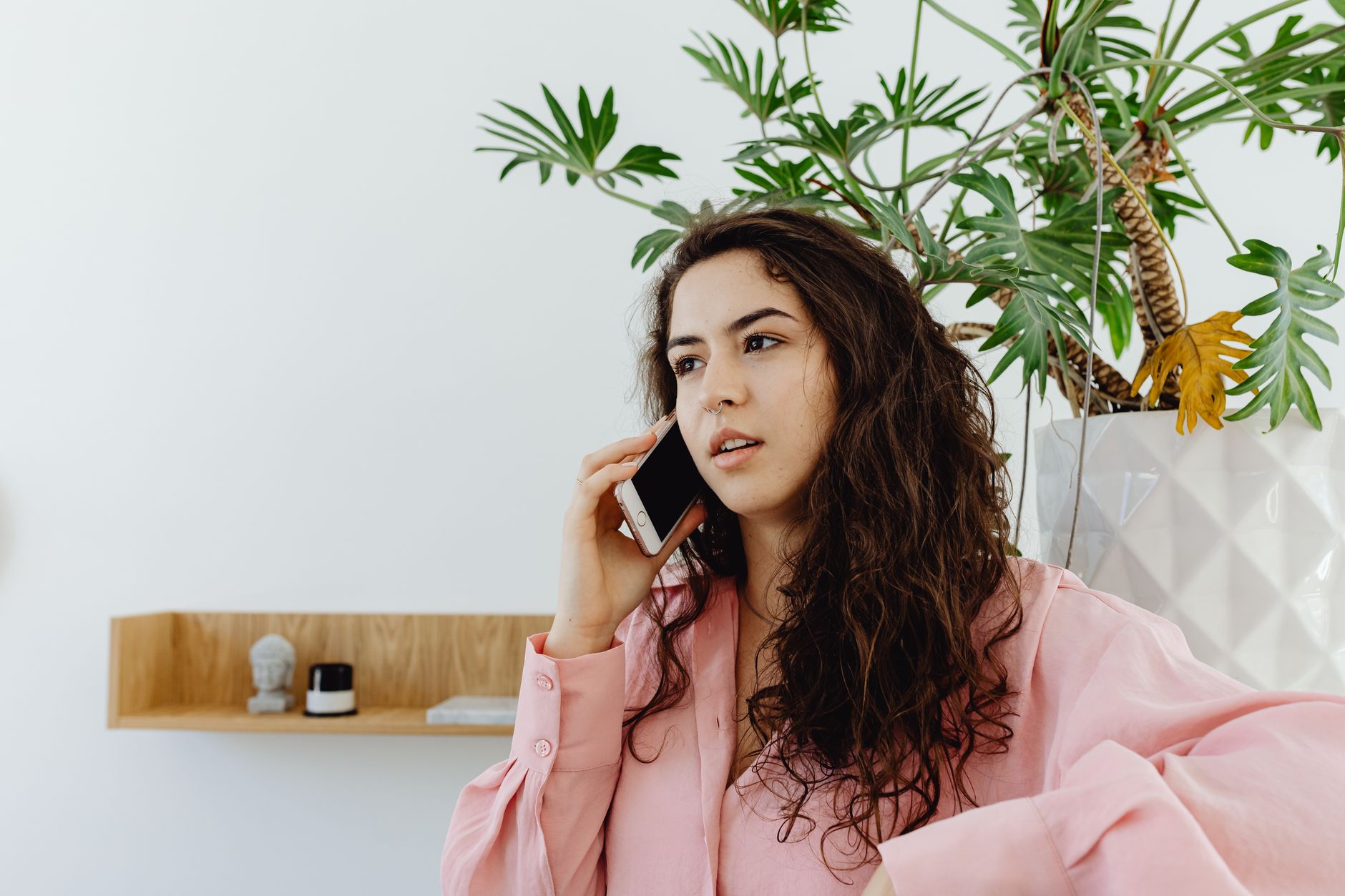 Customer placing a delivery order by phone at home