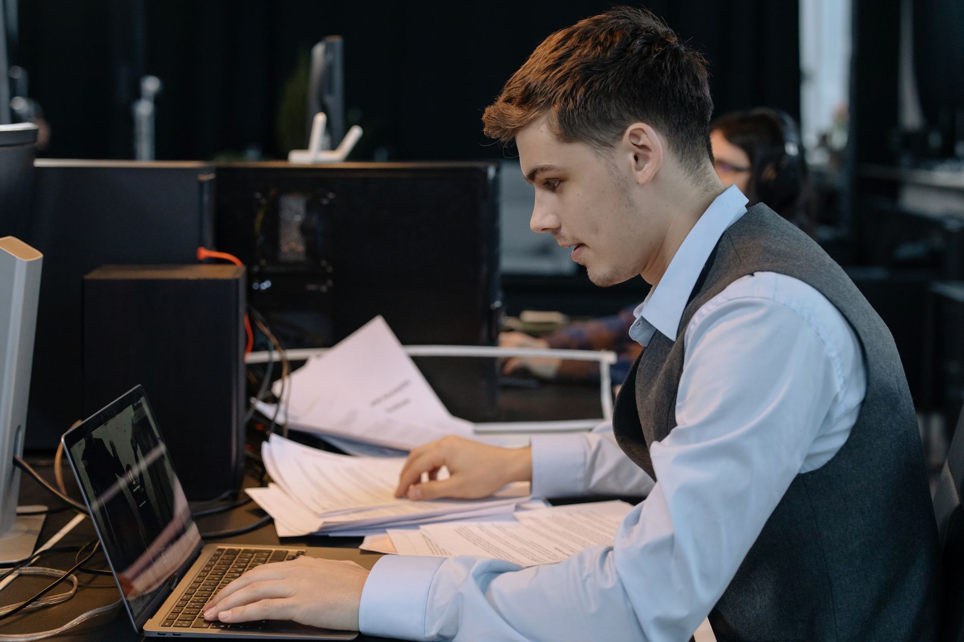 Dispatcher reviewing the day's schedule at a desk