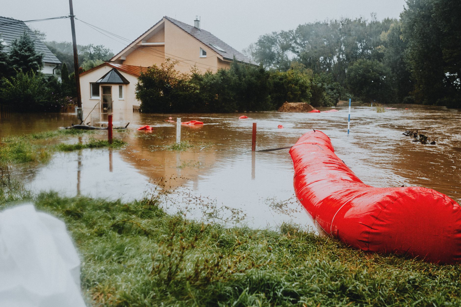 Flooded yard and house after a storm