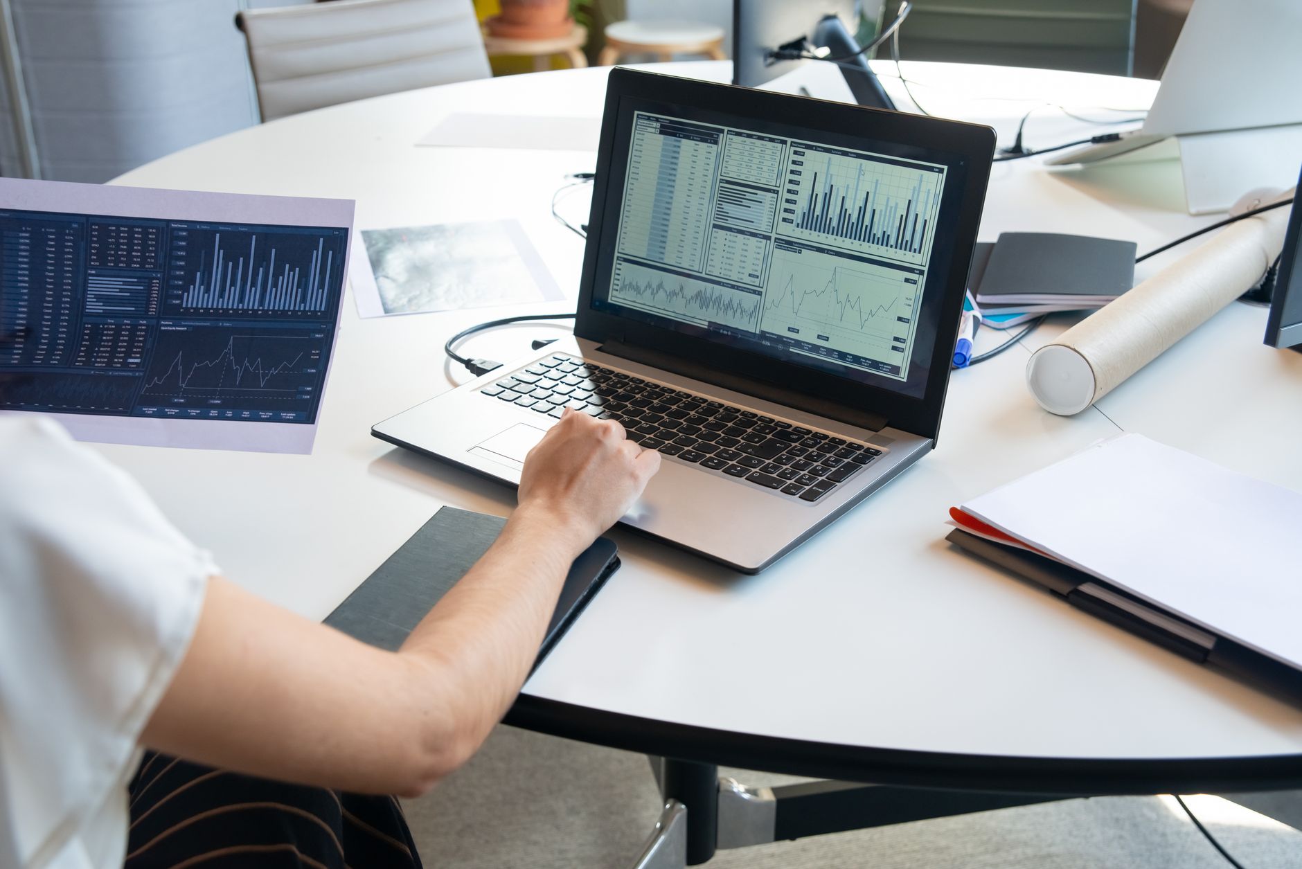 Team reviewing lead list data on a laptop