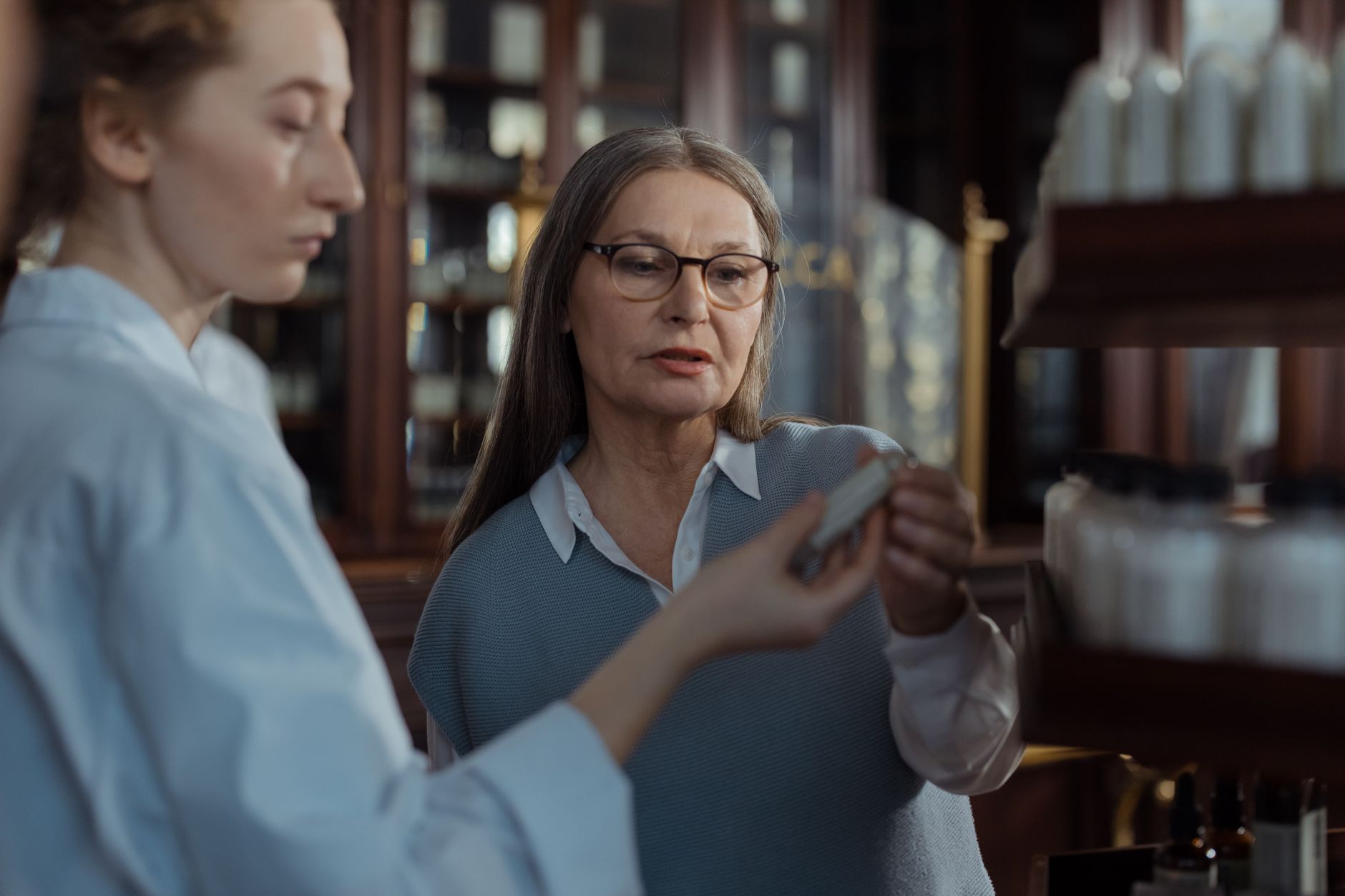 Pharmacist talking with a patient
