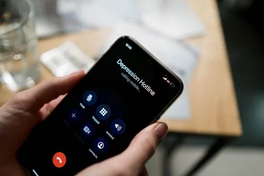 Phone screen with the keypad open for a survey answer