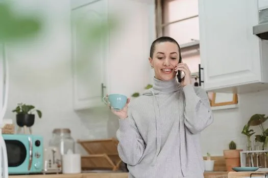 Customer answering a follow-up call at home