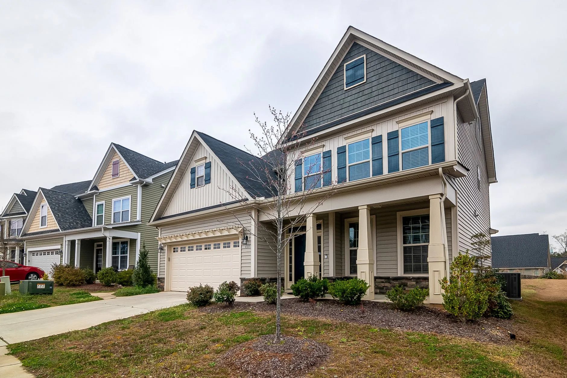 Row of suburban homes with driveways in a residential service area