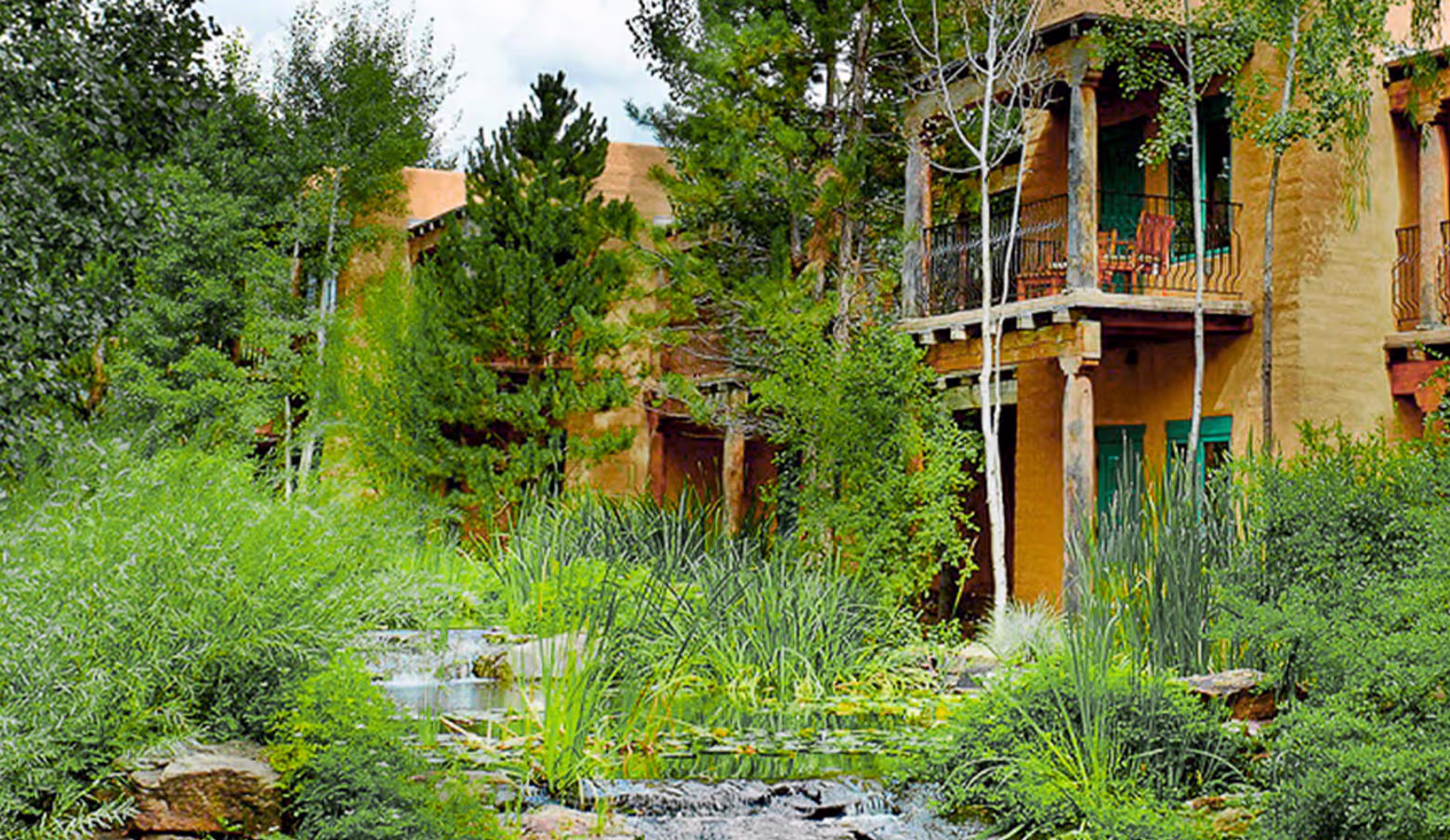 Luxury resort grounds with lush plants and trees