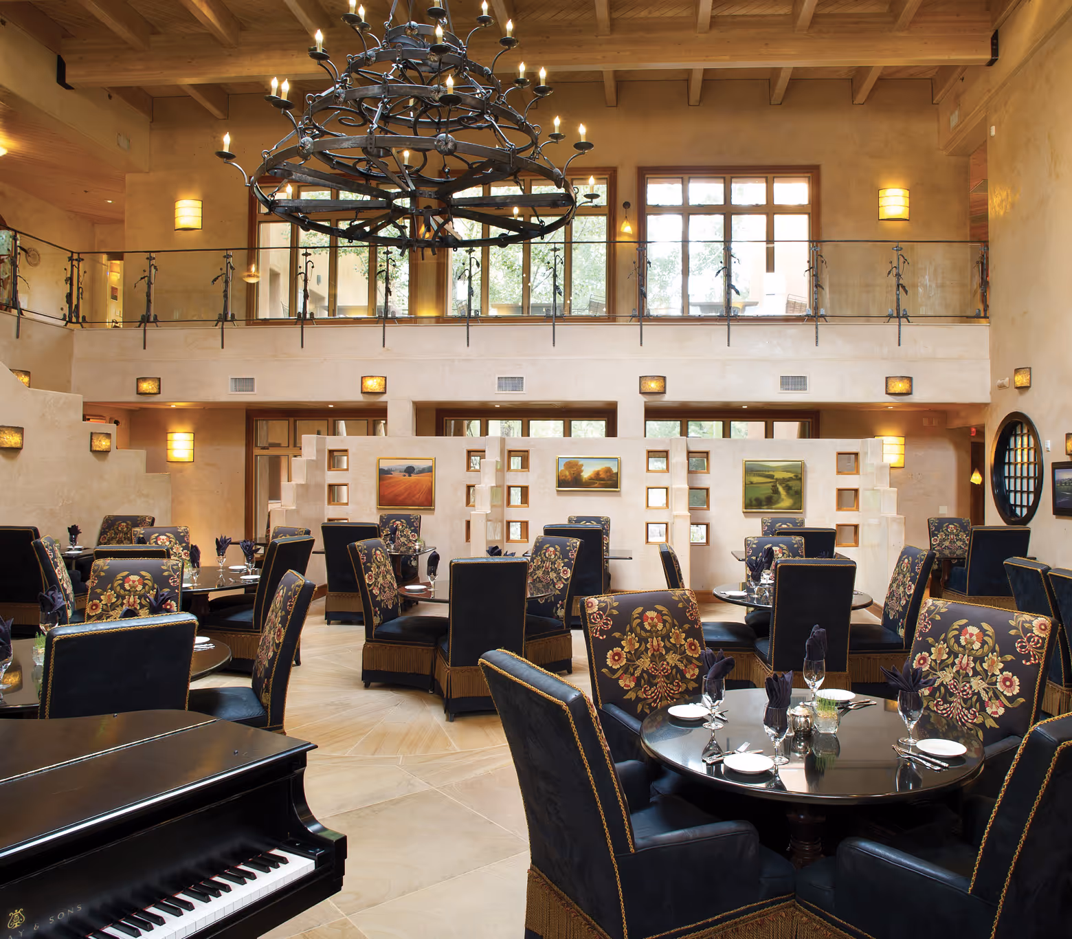 Dining room with round tables and fabric chairs