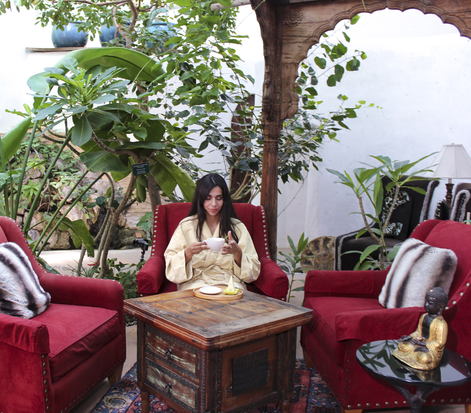 Woman drinking tea in Living Spa