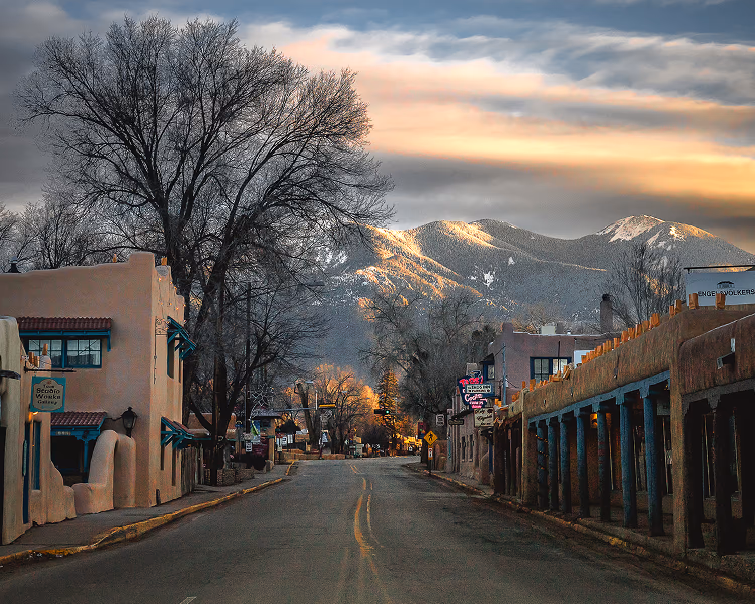 Taos in winter with snowy mountains in background