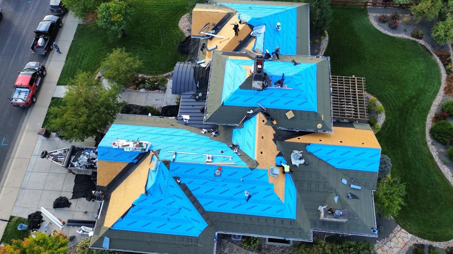 Protective roofing underlayment being installed on a Timnath home before the new shingles.