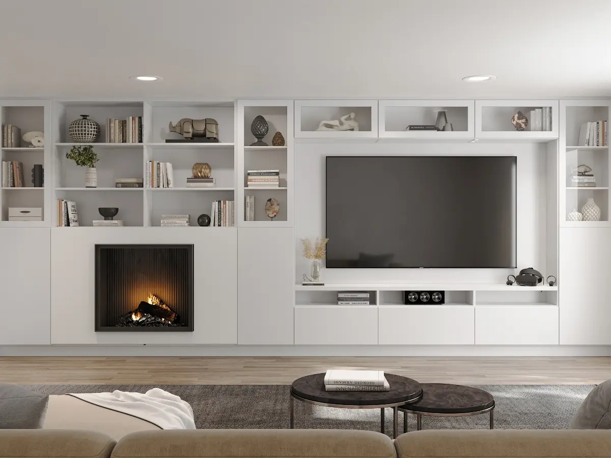 Custom white living room wall unit with a built-in fireplace, TV niche and open display shelving