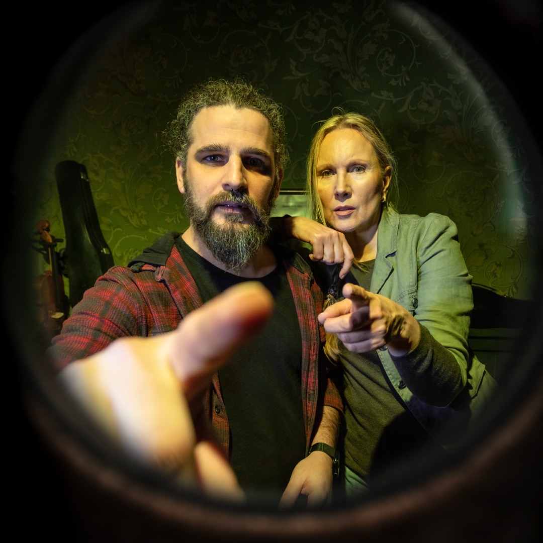 Players seen through a peephole inside Sherlock's Brain Fog
