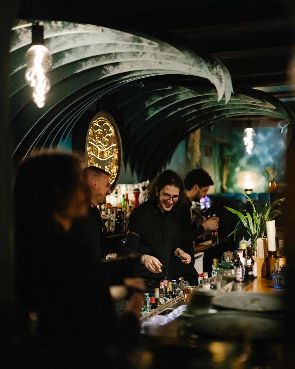 Mixologists at work behind the bar