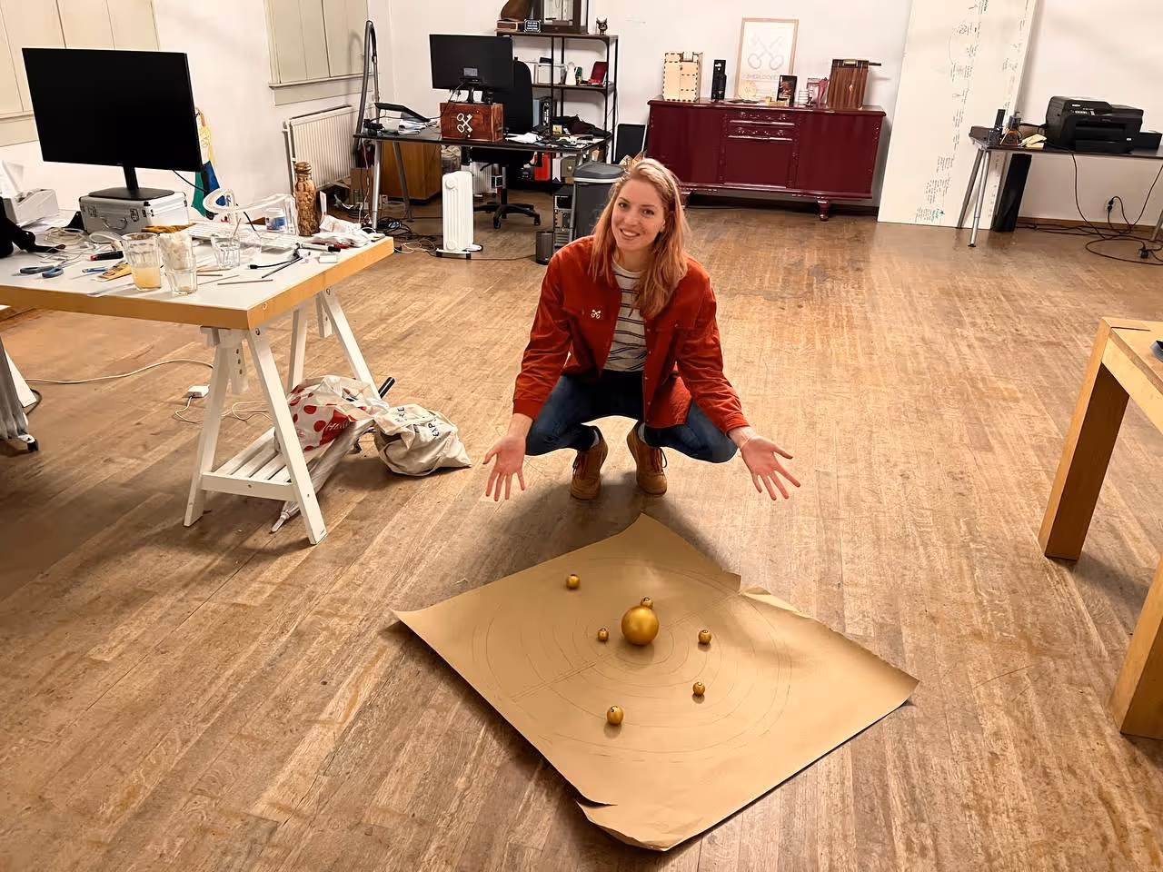 Francine Boon designing the planets puzzle for The Alchemist escape room in Amsterdam