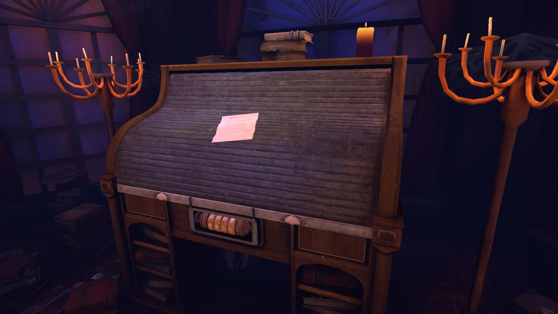 A dark, atmospheric roll-top desk in the Ada’s Study mobile escape game, featuring a mysterious letter, a cylinder combination lock, and flickering orange candelabras.