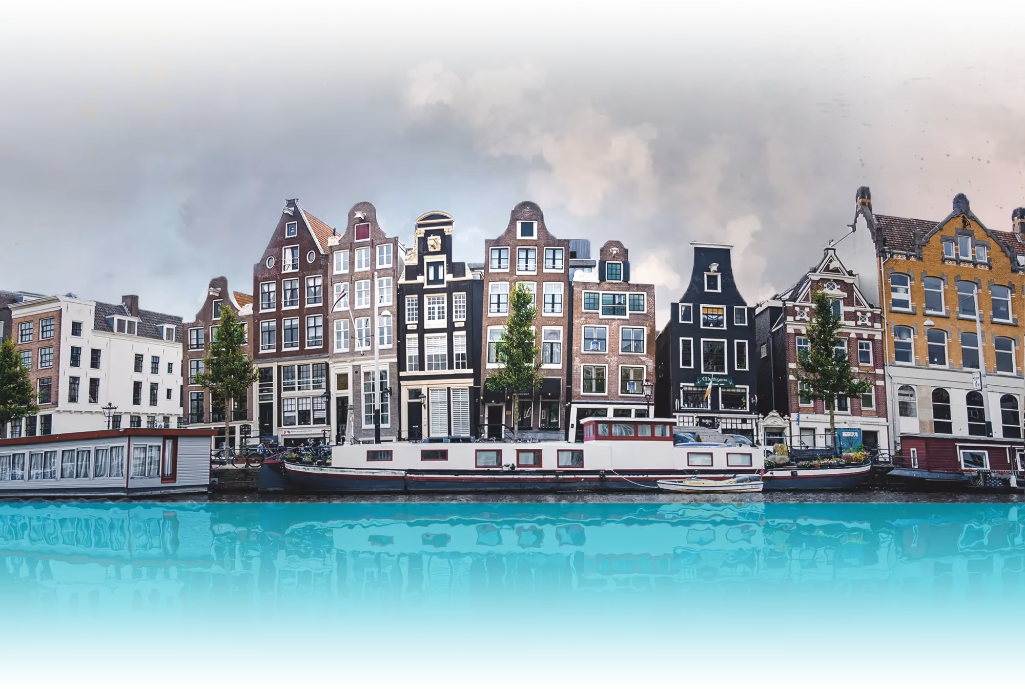 A scenic Amsterdam canal view reflecting the 'sinking city' mystery of the Atlantis Protocol outdoor escape game by Sherlocked.
