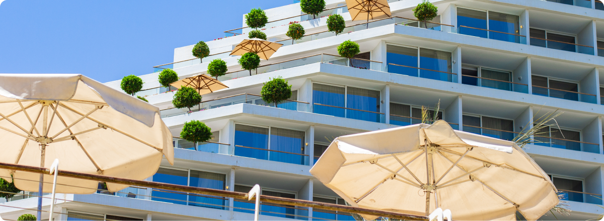 Hotel property exterior with umbrellas