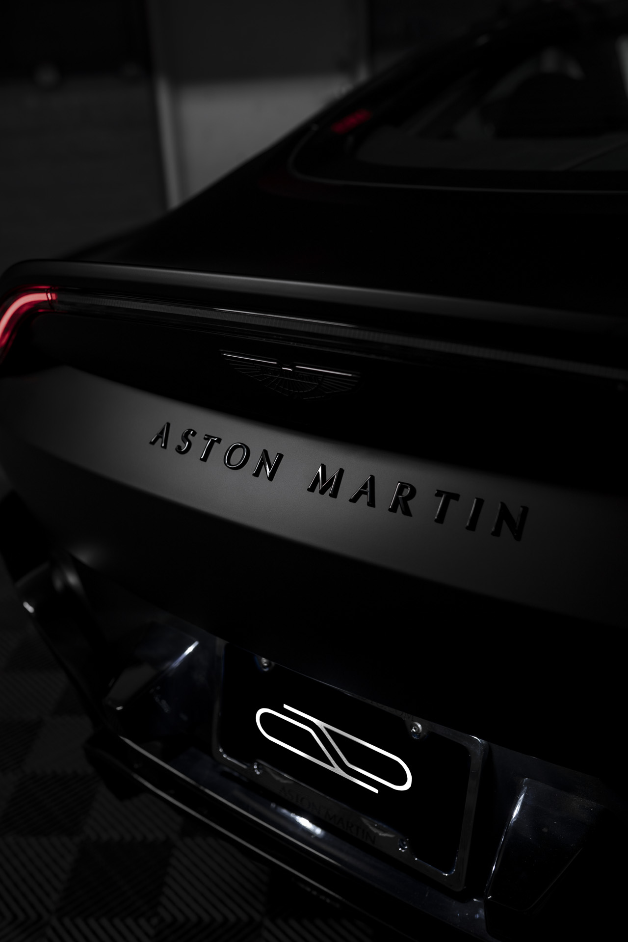 Aston Martin car in dark garage