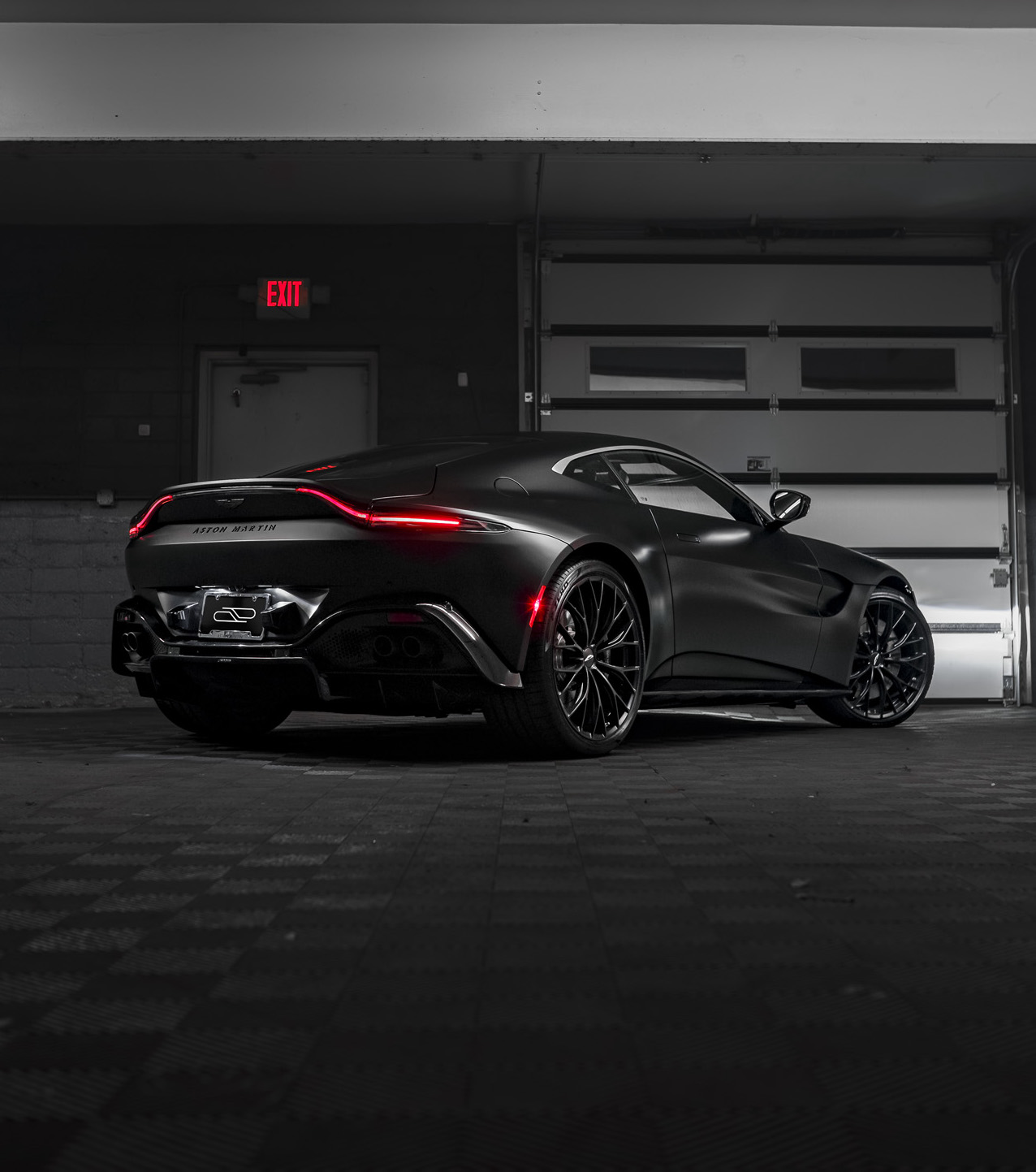 Aston Martin car in dark garage