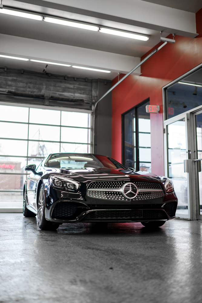 Black Mercedes-Benz SL450 with paint protection film and ceramic coating at Pristine Detail