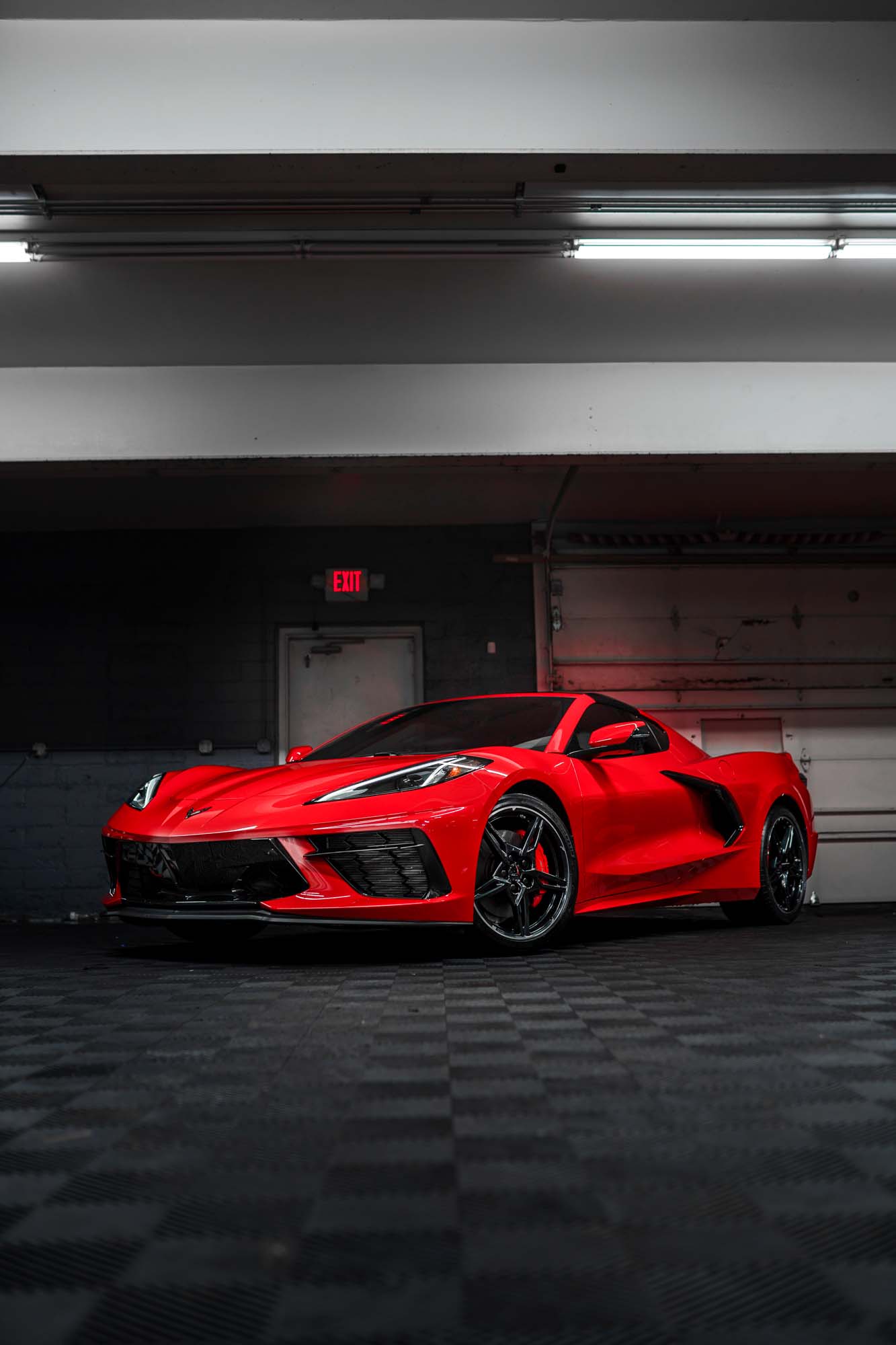 Red C8 Corvette Stingray with paint protection film, ceramic coating, and window tint from Pristine Detail
