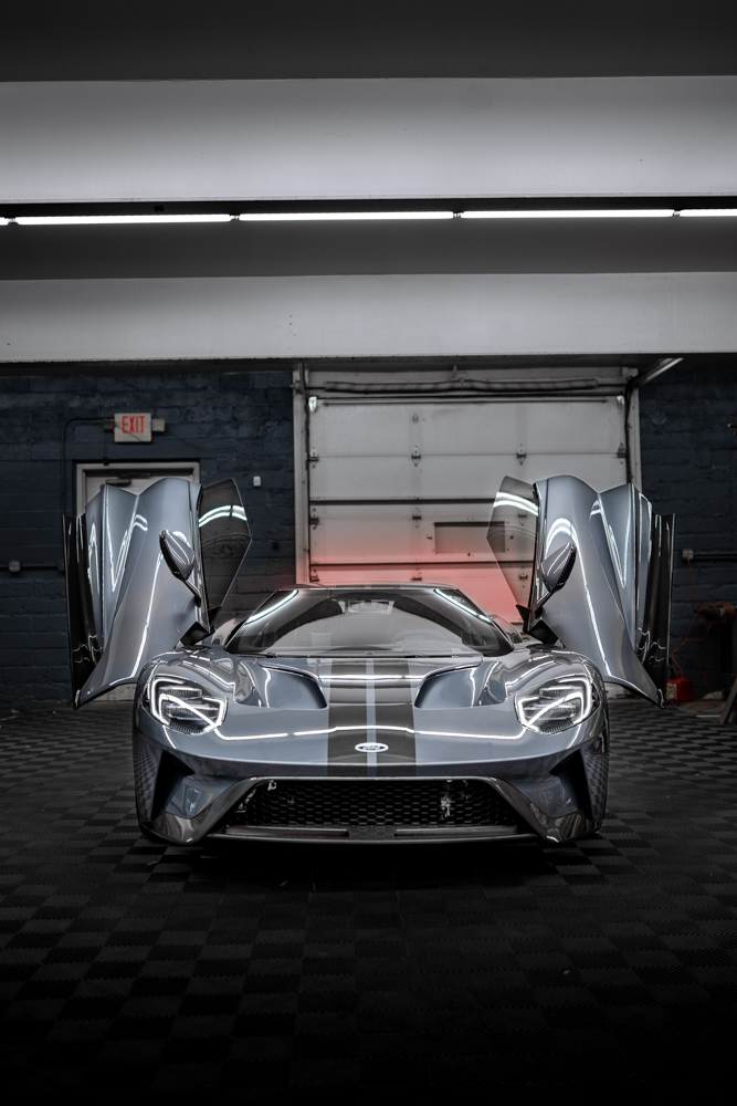 Head-on view of the Ford GT with its doors raised