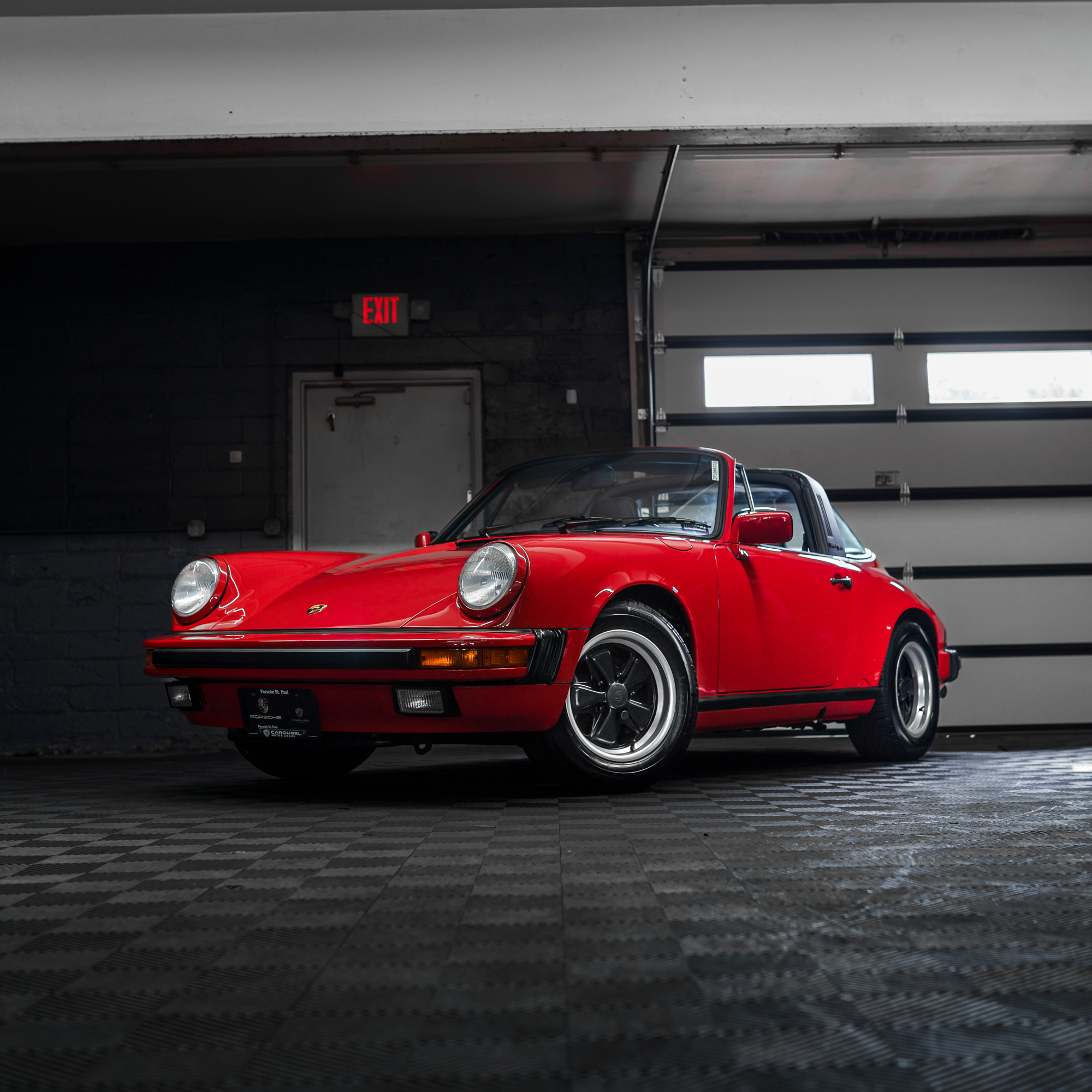 Red 1987 Porsche 911 Carrera Targa with paint protection film and ceramic coating at Pristine Detail