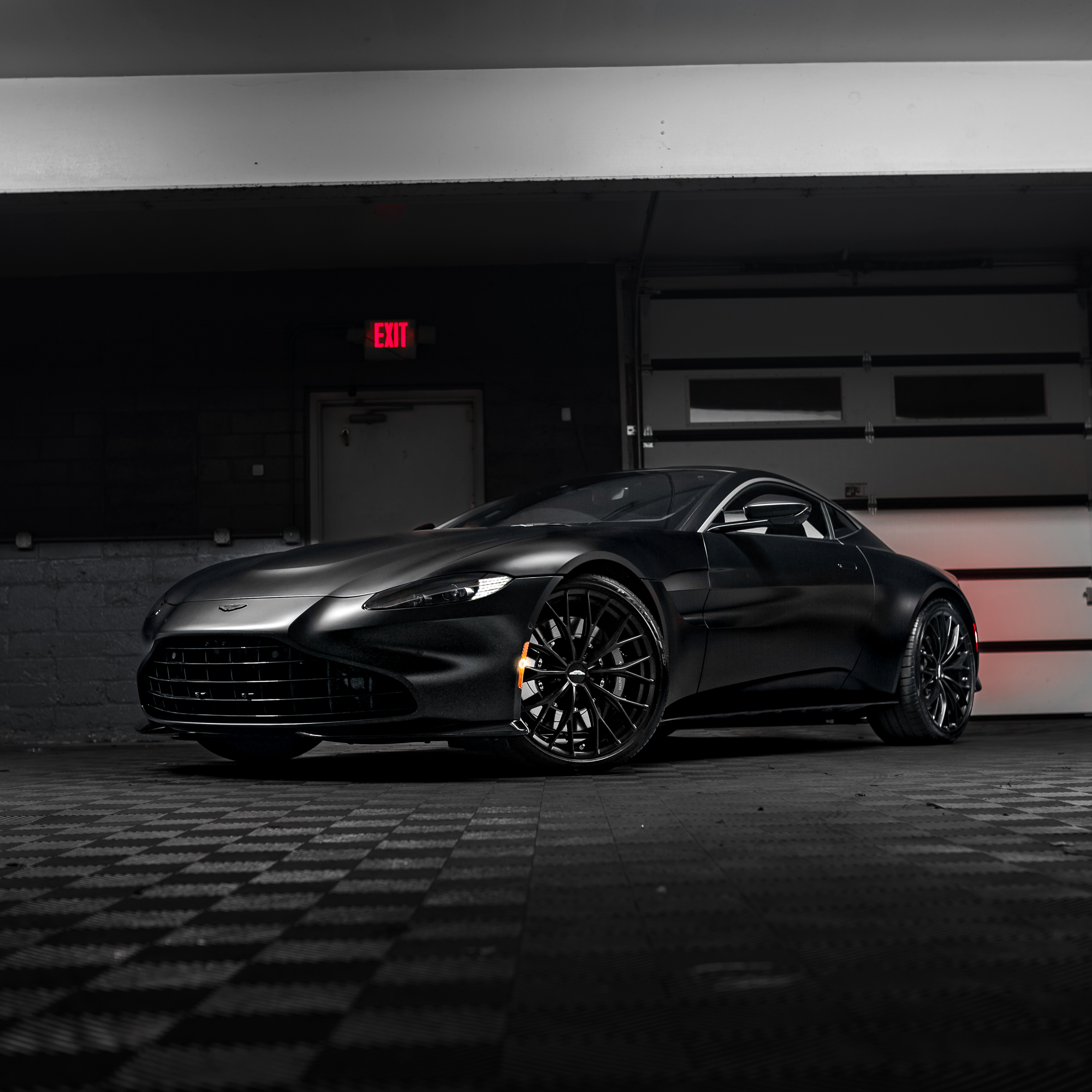 Black Aston Martin Vantage with paint protection film and ceramic coating at Pristine Detail